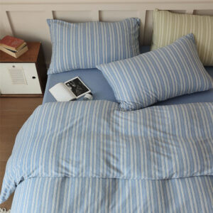 Blue Striped Cotton Bedding Set on a Bed