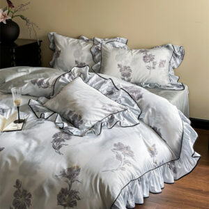 Luxury cotton bedding set in light green with ruffled edges