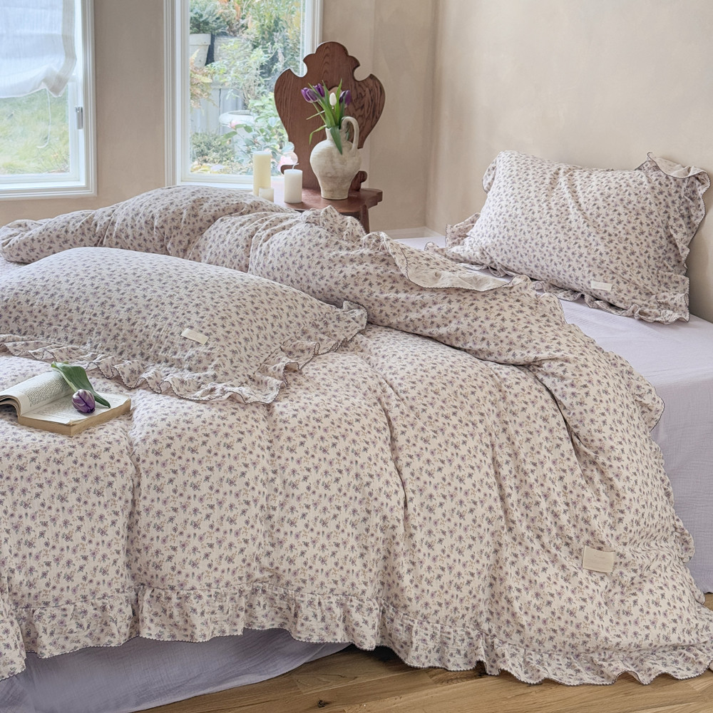 Cottagecore style floral bedding with soft purple tones