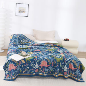 cotton jacquard dinosaur throw blanket on bed