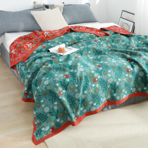 Underwater Garden throw blanket on bed with sea life pattern