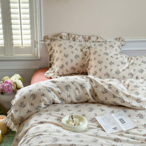 Vintage rose duvet cover set with ruffled edges in cotton muslin fabric.