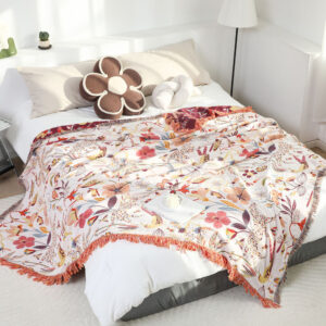 Wild Garden throw blanket laid on a bed