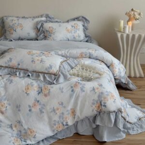 Dusty blue floral gauze bedding set with ruffled edges – full bed view