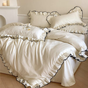 Ivory cotton sateen ruffle bedding set with black trim – elegant silky texture